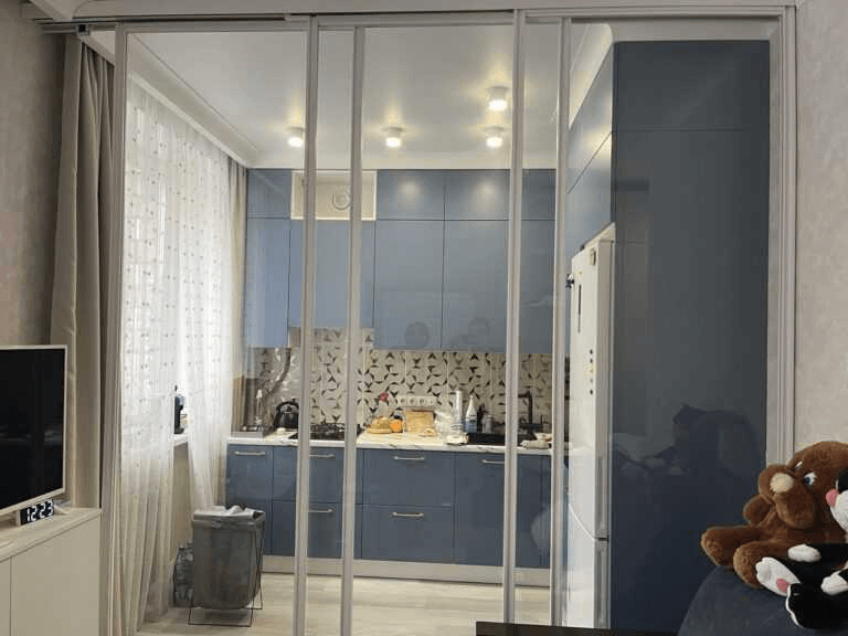 Объединение кухни с газовой плитой и комнаты